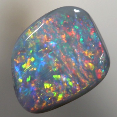 SOLID SEMI BLACK OPAL Sparkling red and orange over green blue